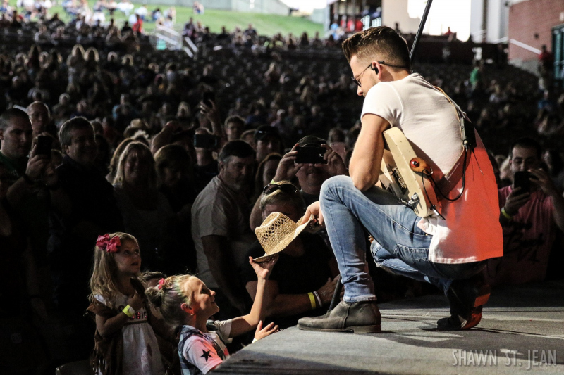 Chase Bryant opening for Brad Paisley in Hartford on August 6, 2017 / Photo by Shawn St. Jean