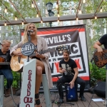 Kelsea Ballerini performing in Bryant Park NYC on September 9, 2015.