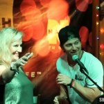 NASH FM's Kelly Ford introducing Kip Moore for his acoustic show at Brother Jimmy's on August 24, 2015