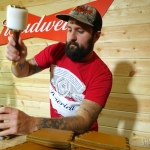 Craftsman from Oowee Products making custom leather coozies.