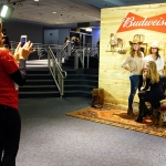 Fans enjoying the Budweiser country photo booth.